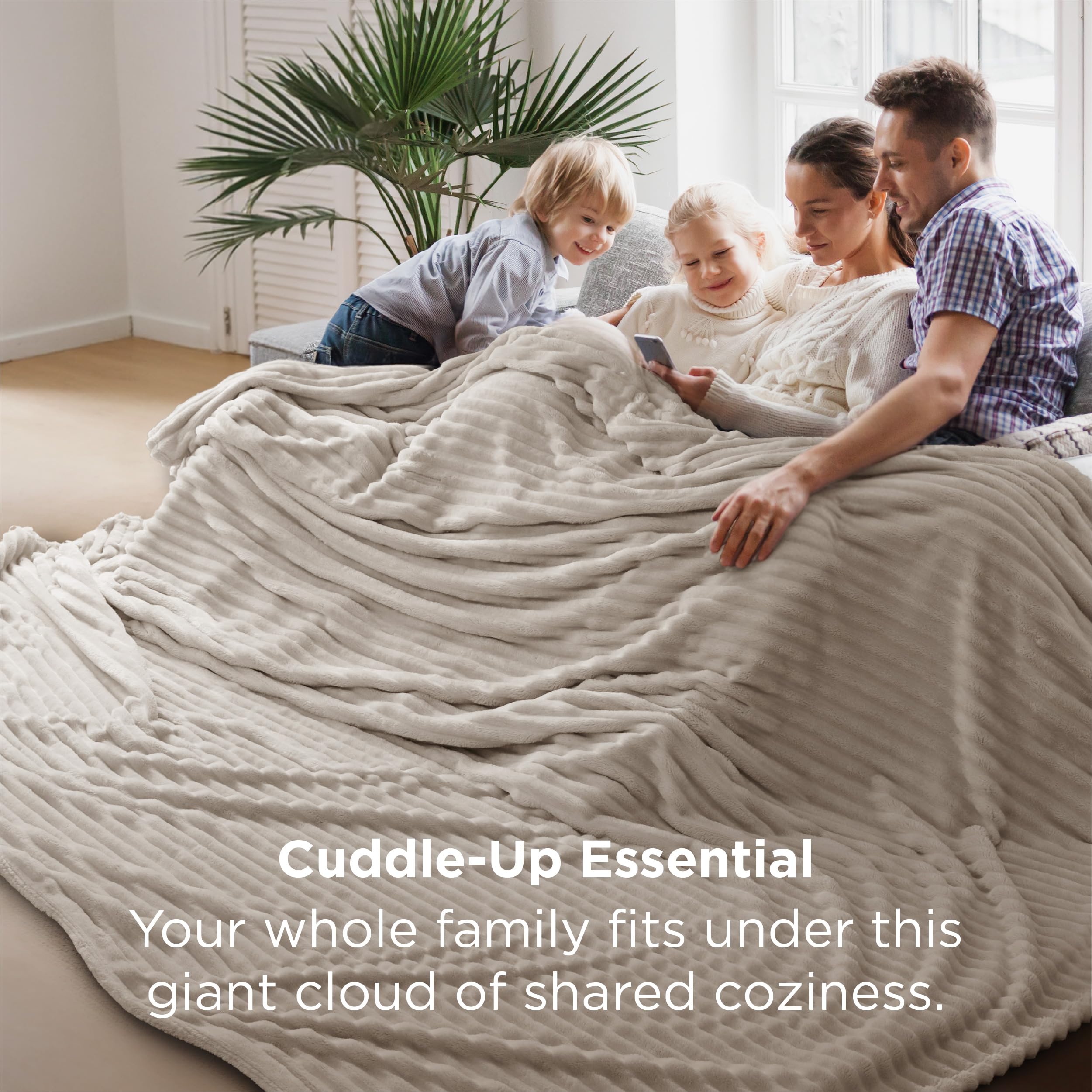 Bedsure GentleSoft blanket on sofa demonstrates versatile lounging and cozy relaxation.