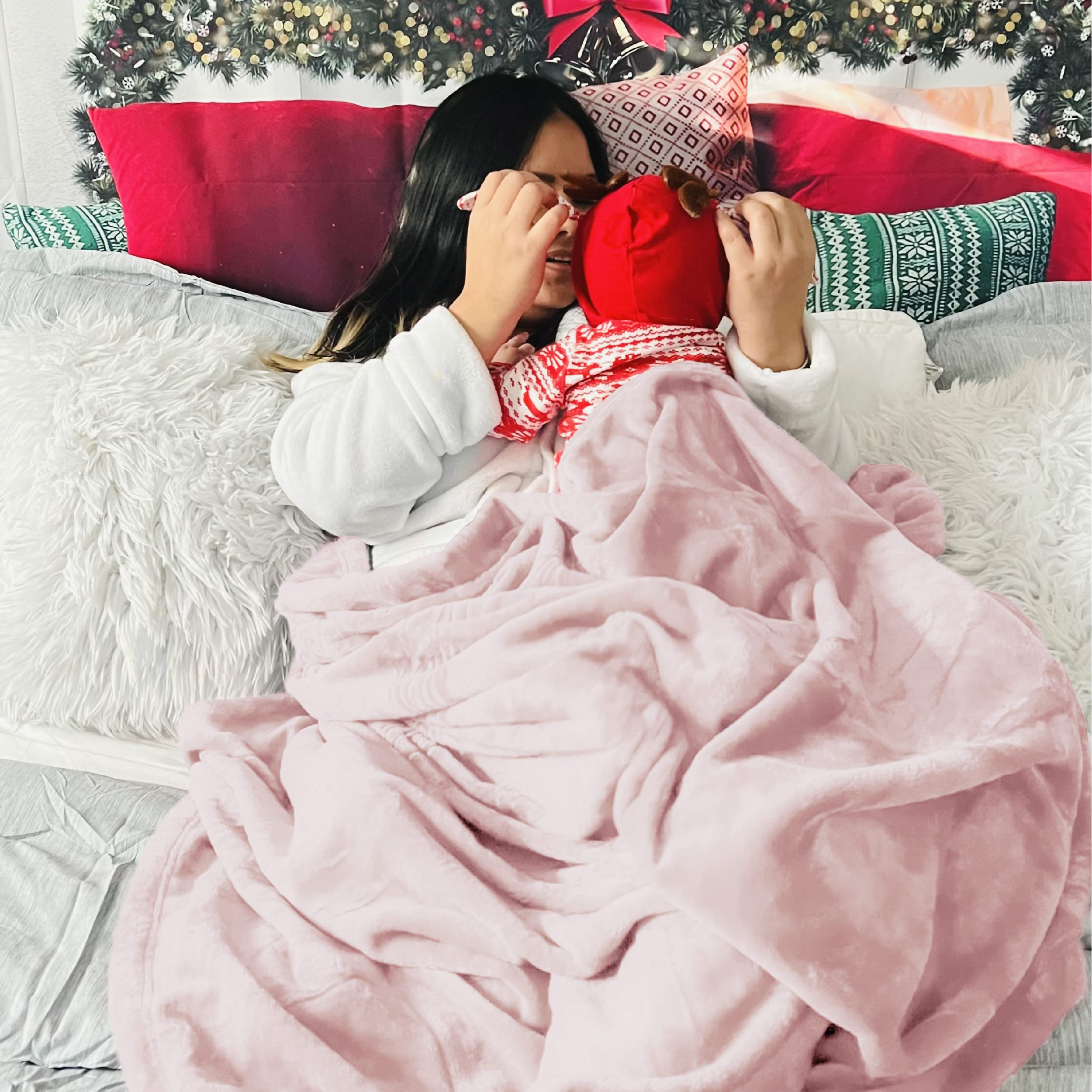 Bedsure GentleSoft pink blanket on sofa as a cozy couch companion.