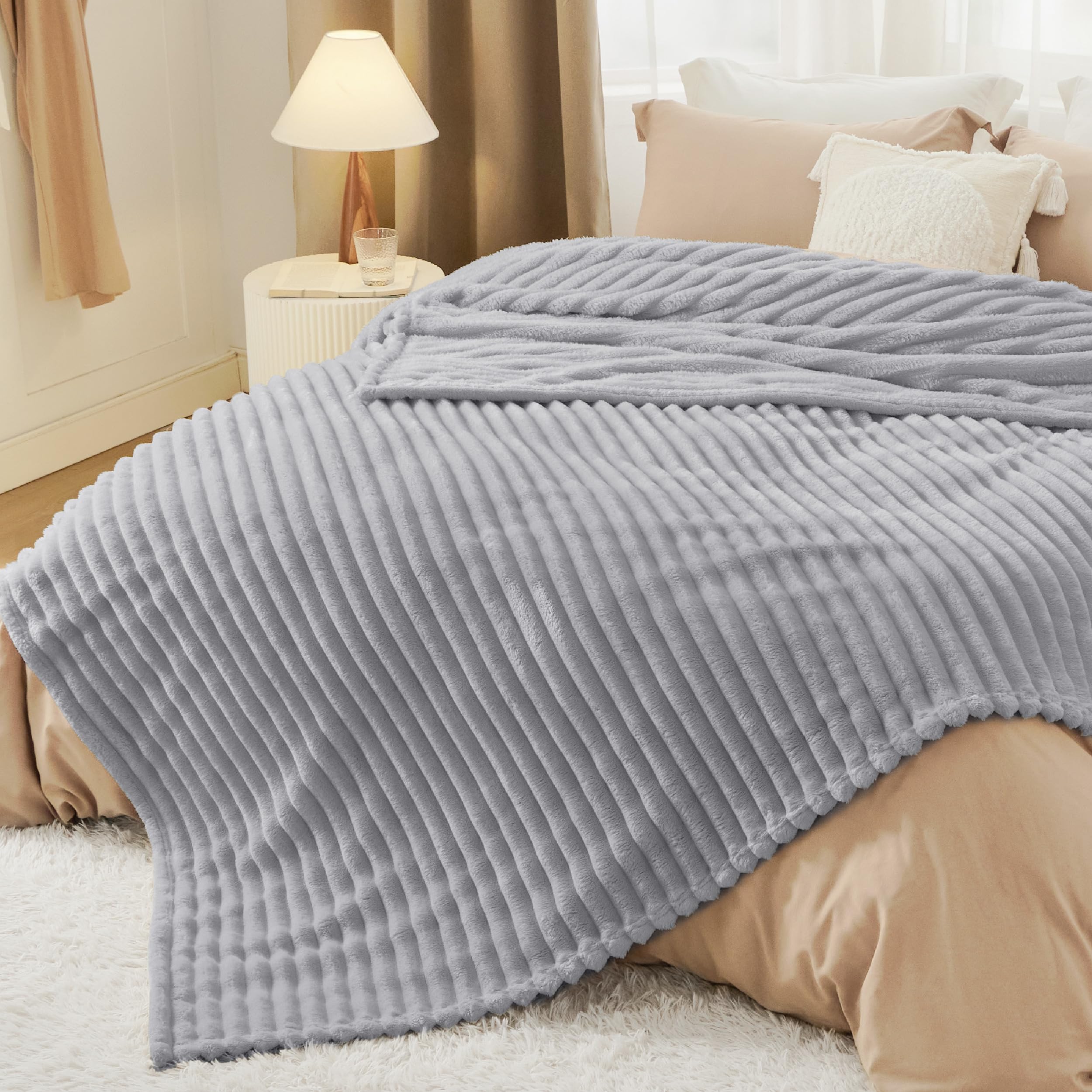 Bedsure GentleSoft light-grey blanket on bed showing queen fit and calm look