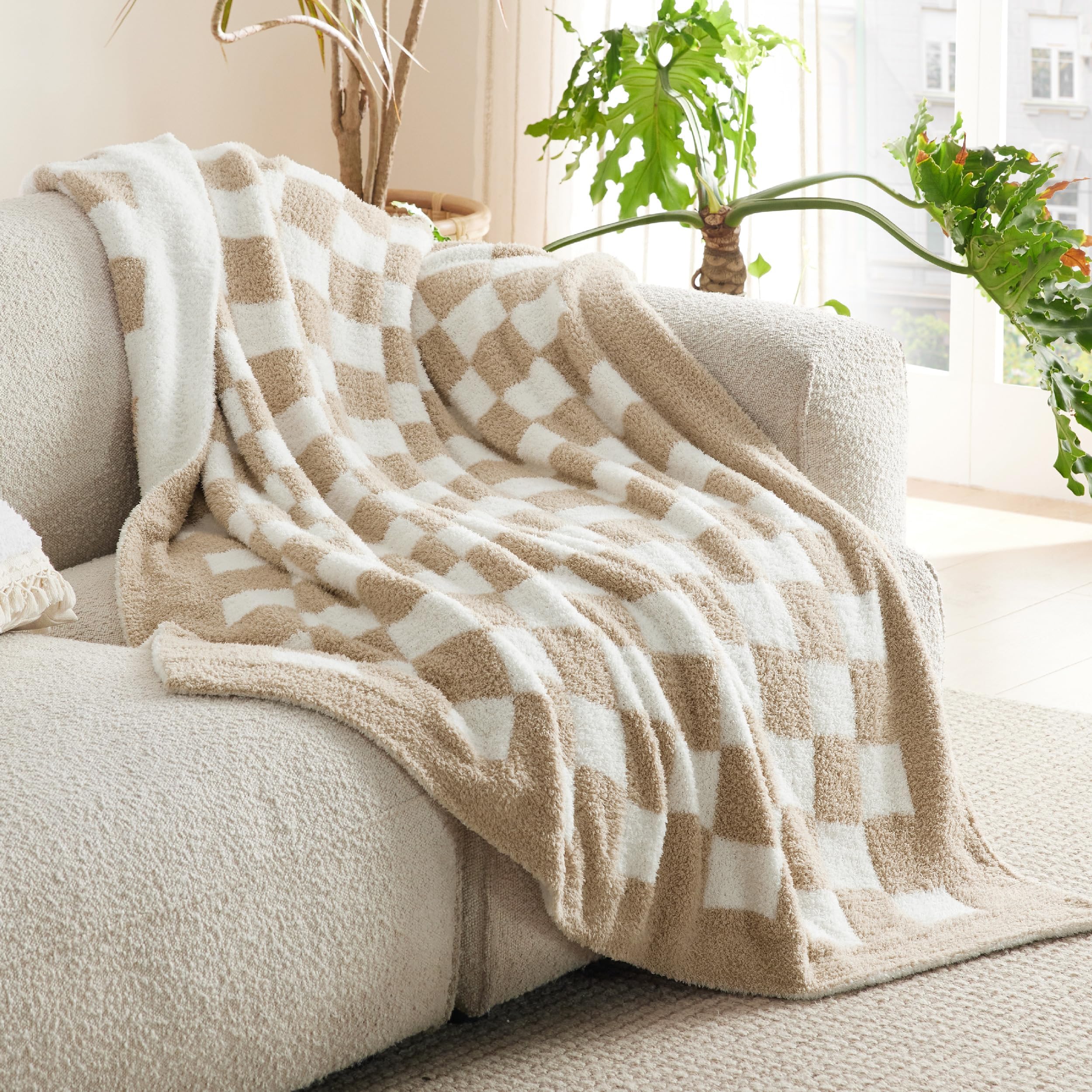 Bedsure GentleSoft blanket draped over sofa for TV time and reading