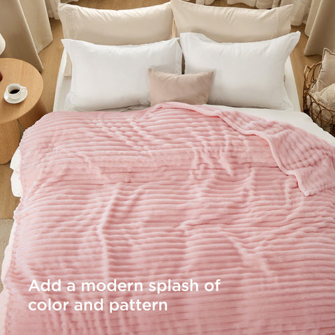 Close-up of Bedsure GentleSoft stripe texture showing durable stitching and plush feel