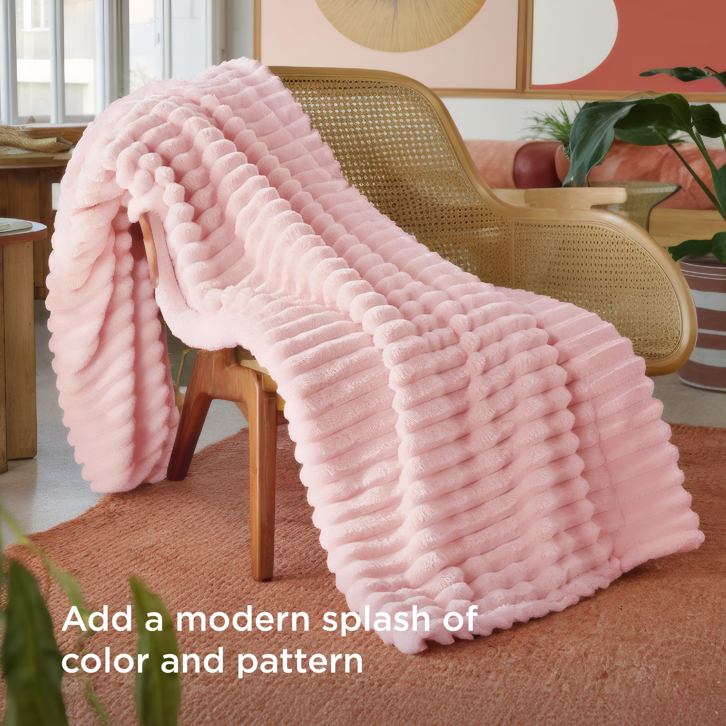 Bedsure GentleSoft coral pink blanket wrapped on bed for cozy warmth