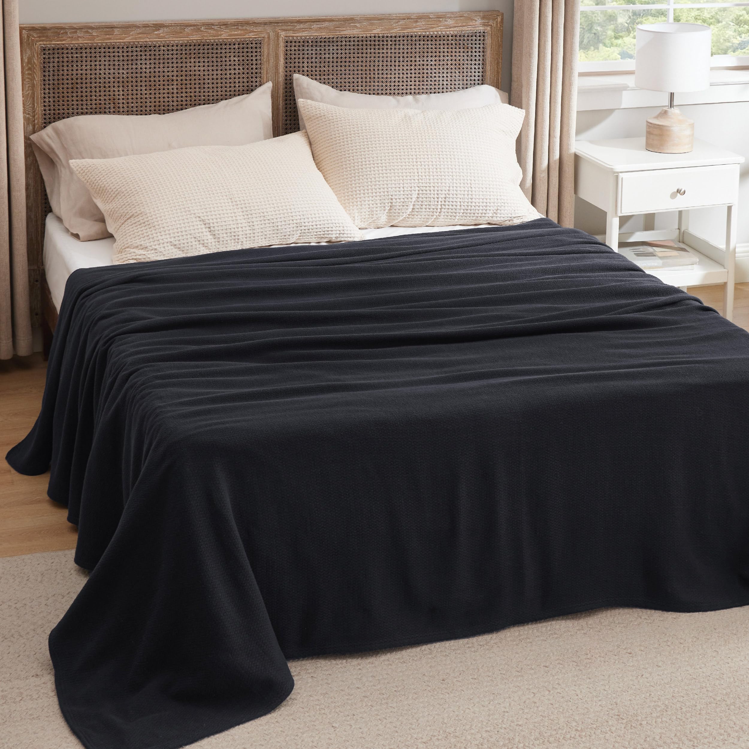 Bedsure GentleSoft blanket in black for modern, versatile decor appeal.