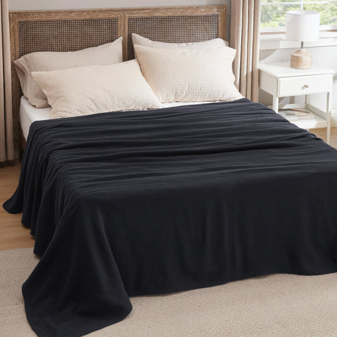 Bedsure GentleSoft blanket in black for modern, versatile decor appeal.