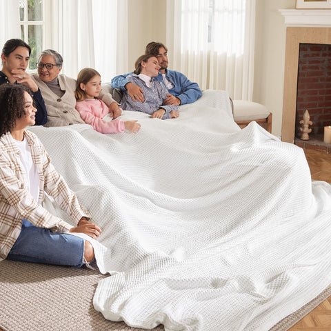 Bedsure Gentlesoft blanket folded for cozy lounging on a couch