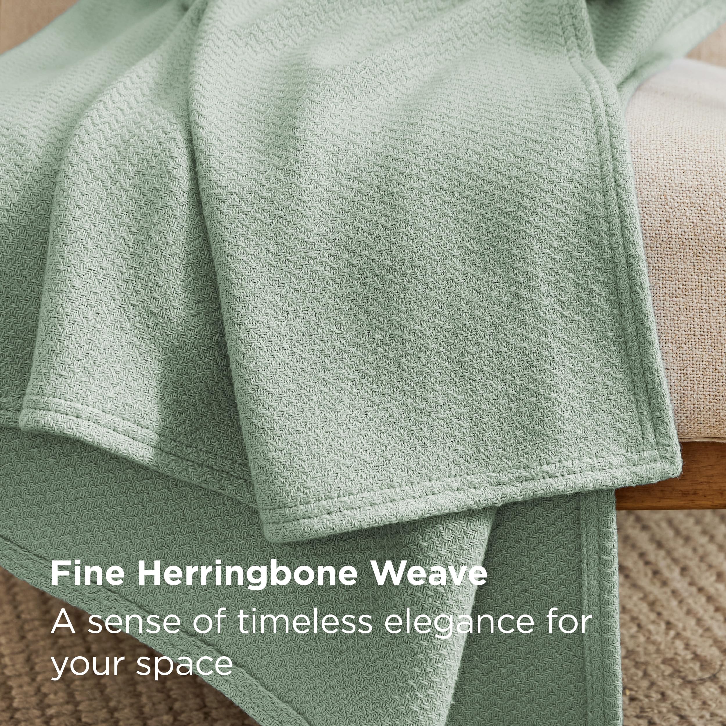 Bedsure GentleSoft cotton throw on a couch for cozy relaxation and quick coverage.