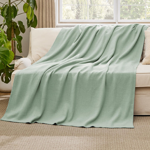 Bedsure GentleSoft cotton throw on an office chair for cool, soft support.