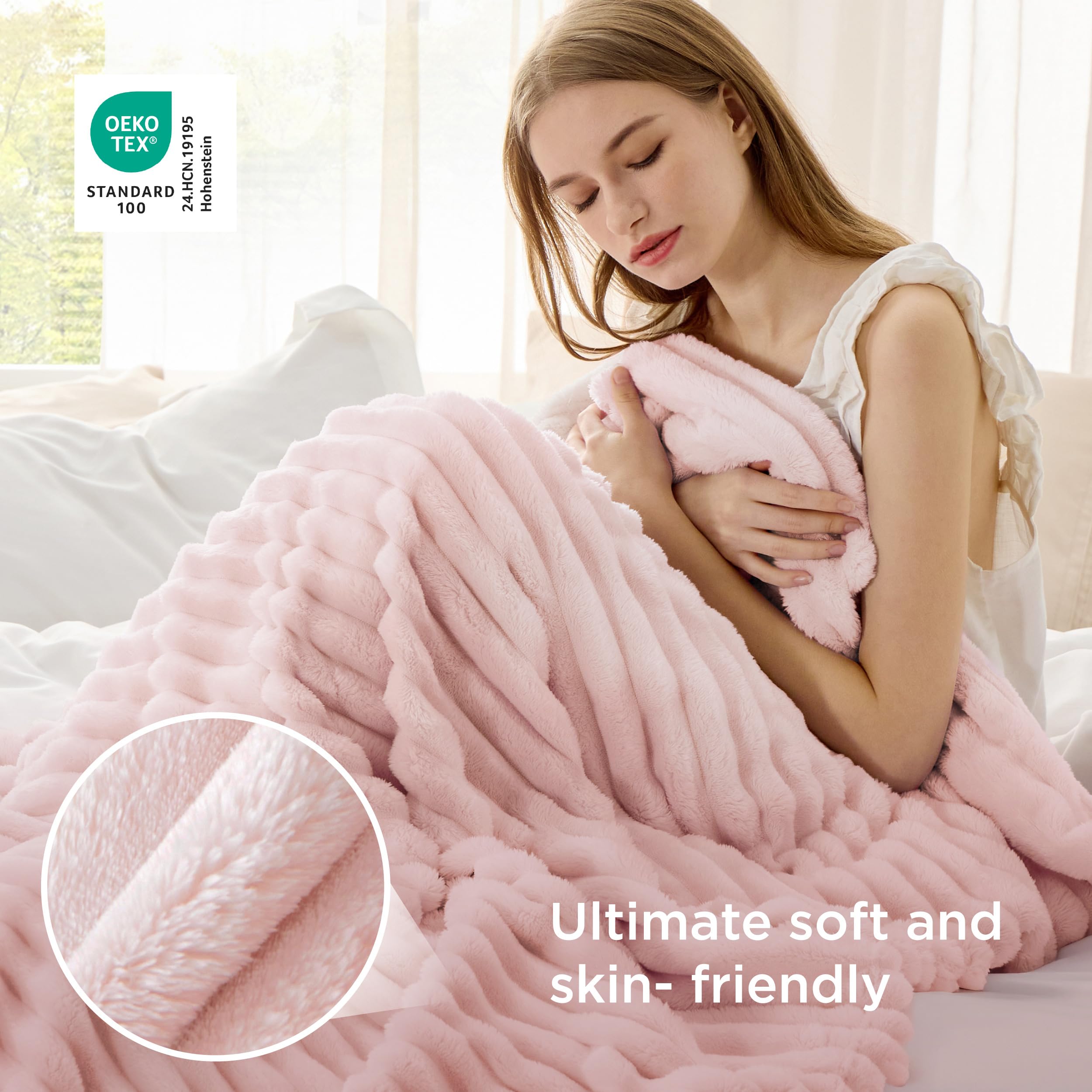 Bedsure GentleSoft Crystal Pink fleece blanket closeup highlights plush texture and durable stitching.