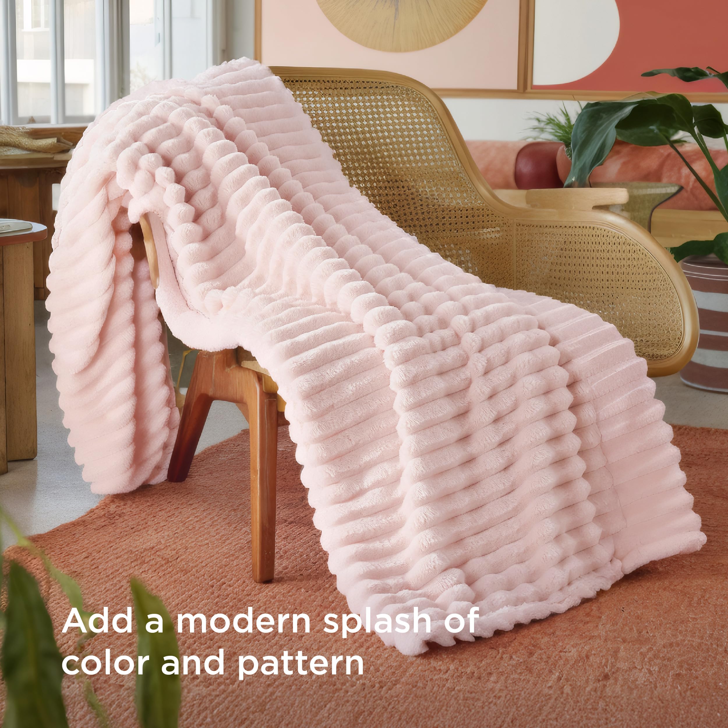 Bedsure GentleSoft crystal pink throw draped over bed for relaxing evenings.