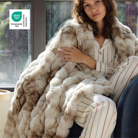 Bedsure GentleSoft double-sided plush with milk velvet back adds skin-friendly warmth.