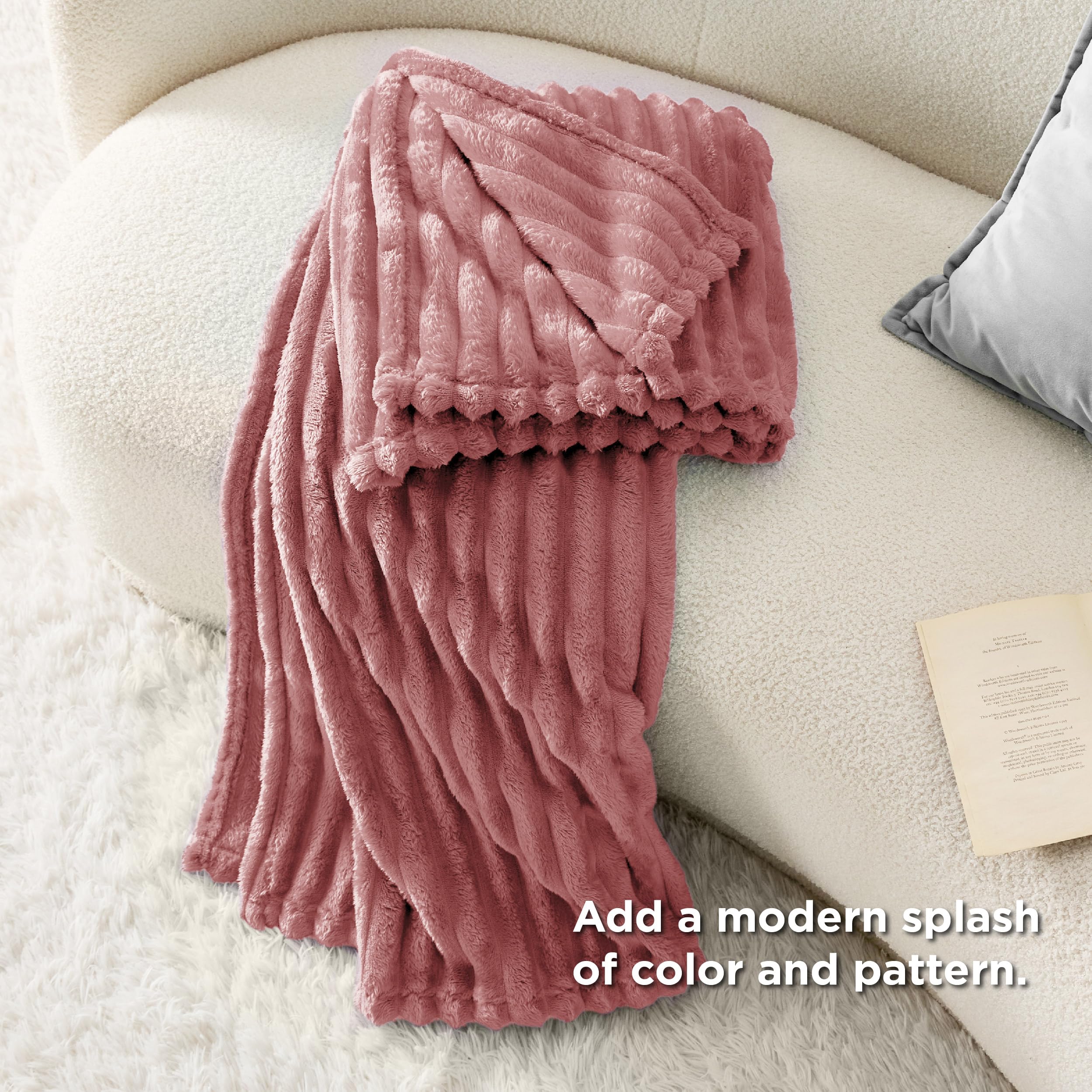 Bedsure GentleSoft Dusty Pink blanket on a bed with long-lasting color