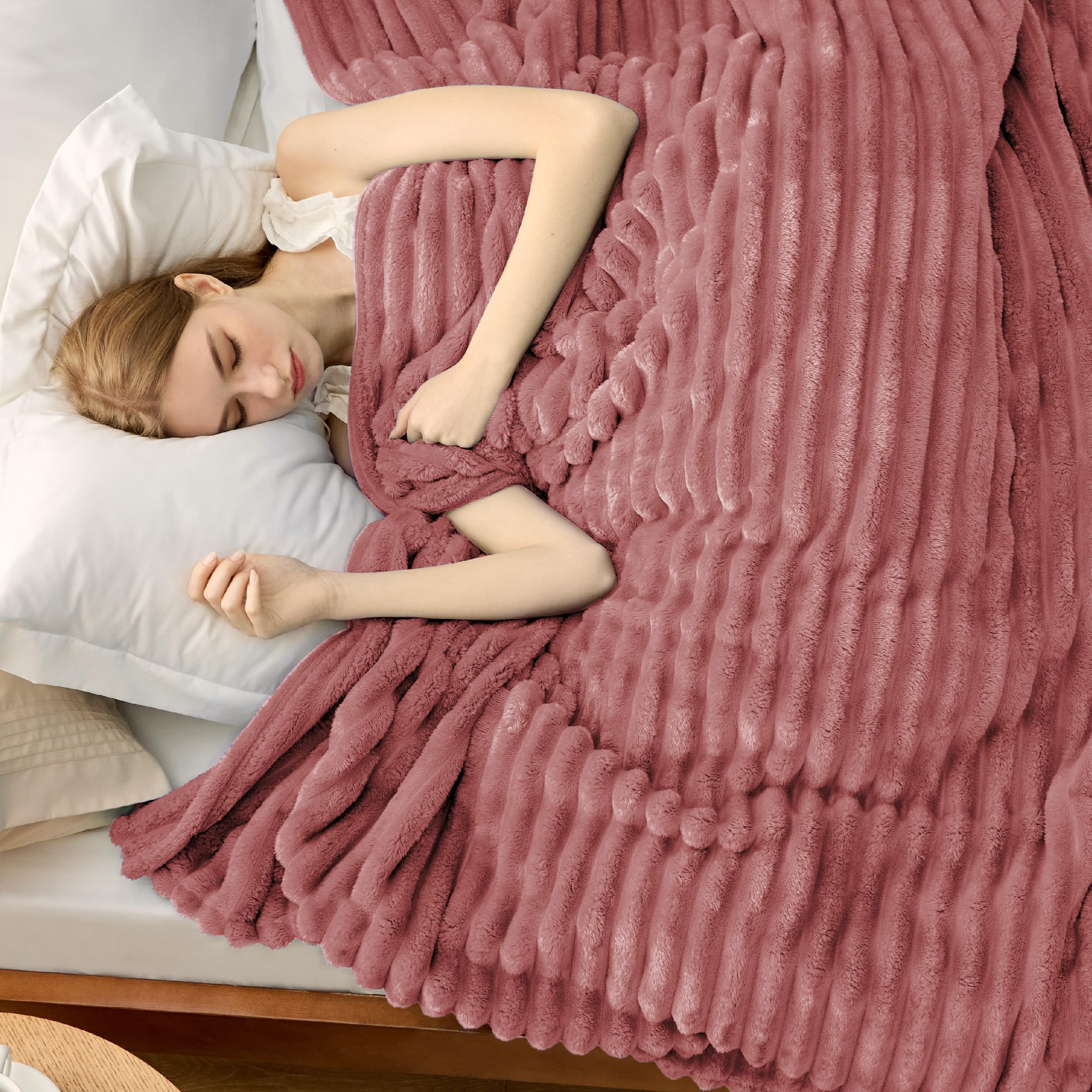 Bedsure GentleSoft dusty pink fleece blanket striped texture adds decorative depth to any room.