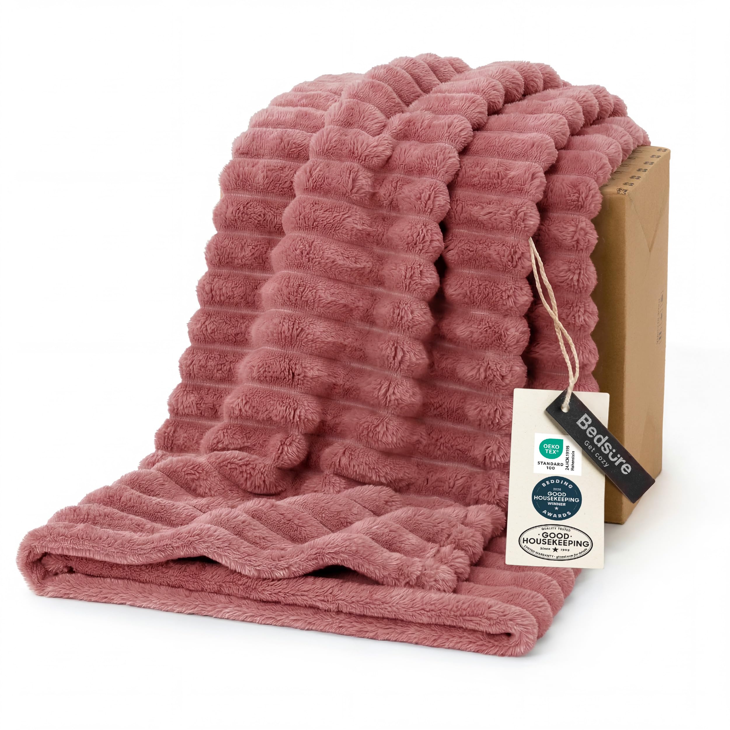 Bedsure GentleSoft Dusty Pink Throw on couch for cozy lounging