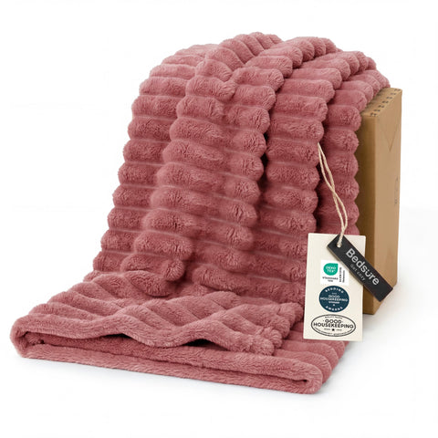 Bedsure GentleSoft Dusty Pink Throw on couch for cozy lounging
