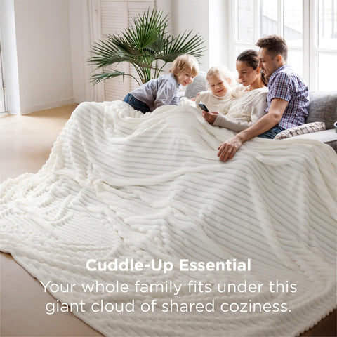 Bedsure GentleSoft blanket on bed shows vibrant stripe pattern coordinating with decor