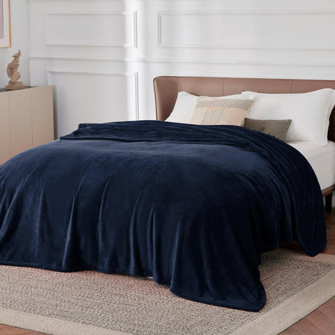 Bedsure GentleSoft fleece blanket in travel bag demonstrates lightweight warmth on the go
