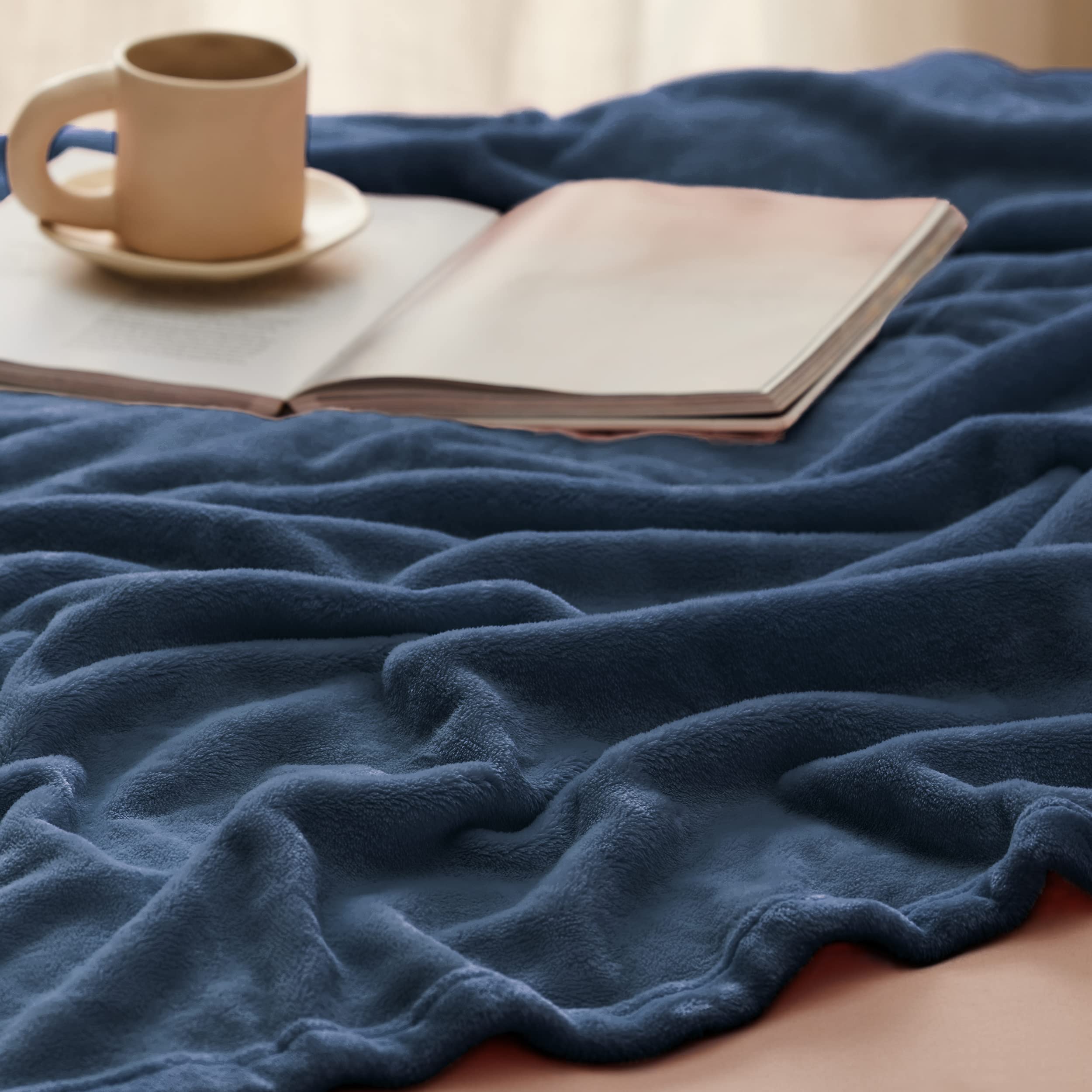 Bedsure GentleSoft blanket in mineral blue complements bedroom decor.