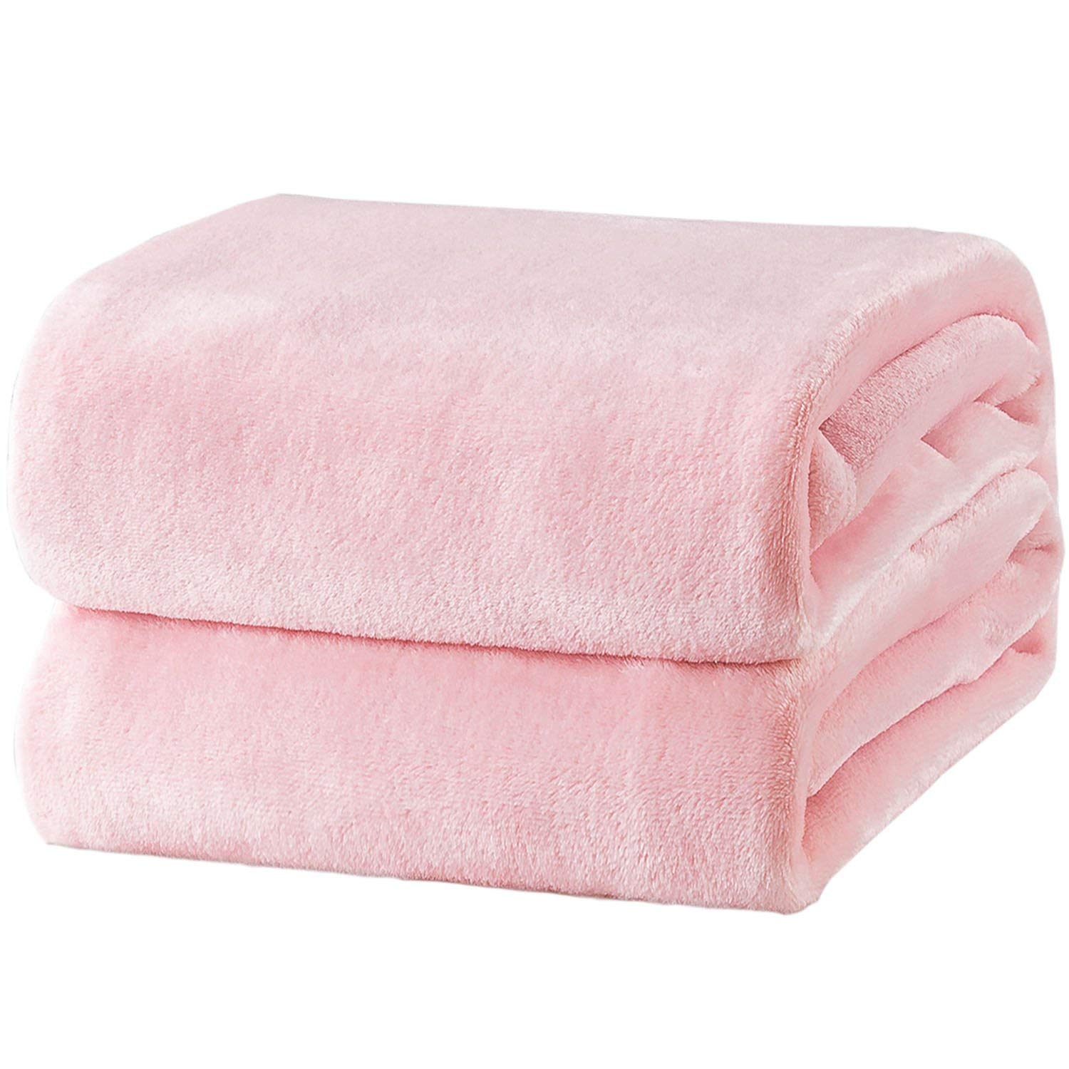 Bedsure GentleSoft fleece blanket king size pink folded on bed for cozy warmth