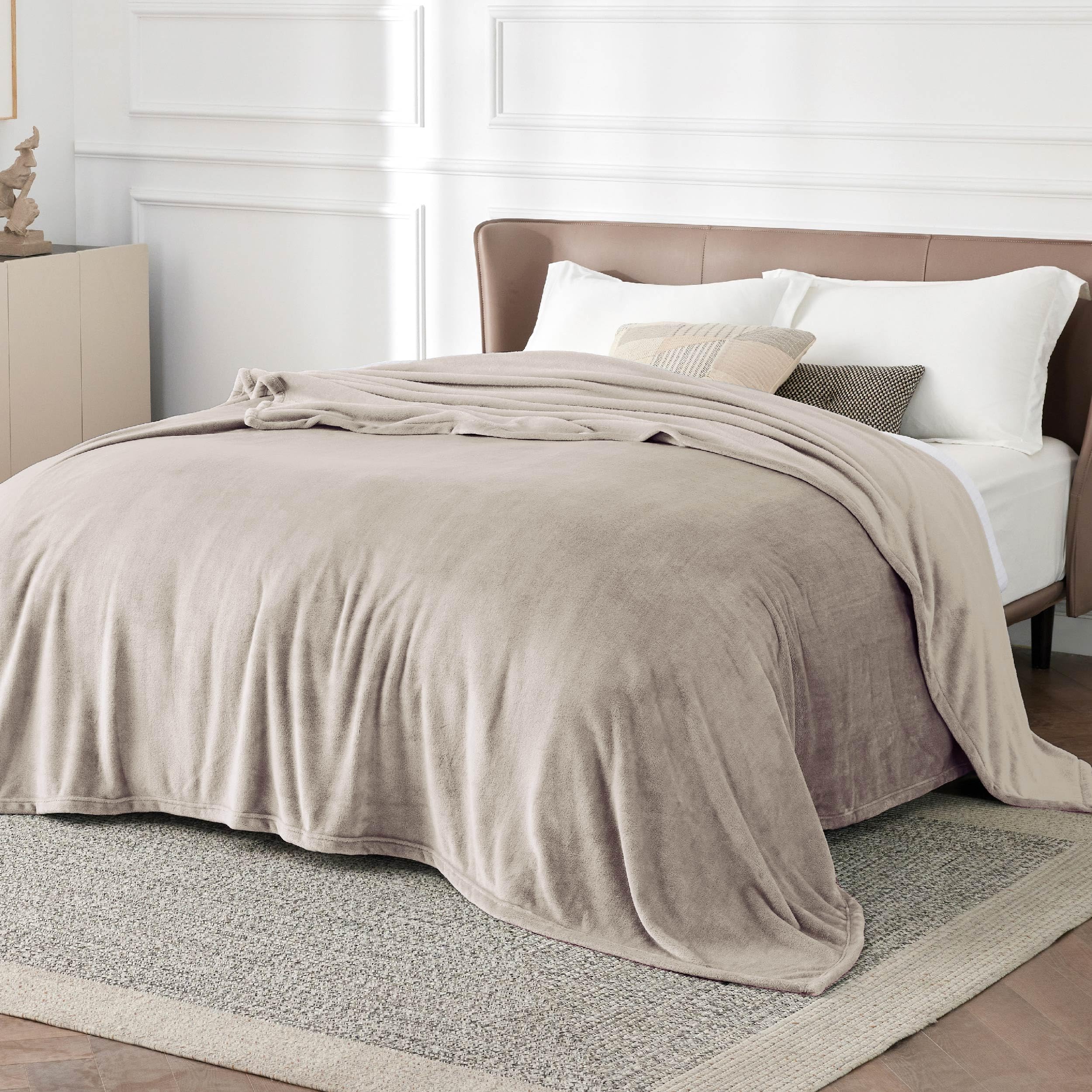 Bedsure GentleSoft fleece blanket on bed in oxford tan for warm nights
