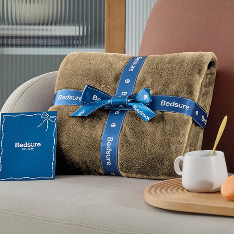 Bedsure GentleSoft blanket with pillows in a modern bedroom setup