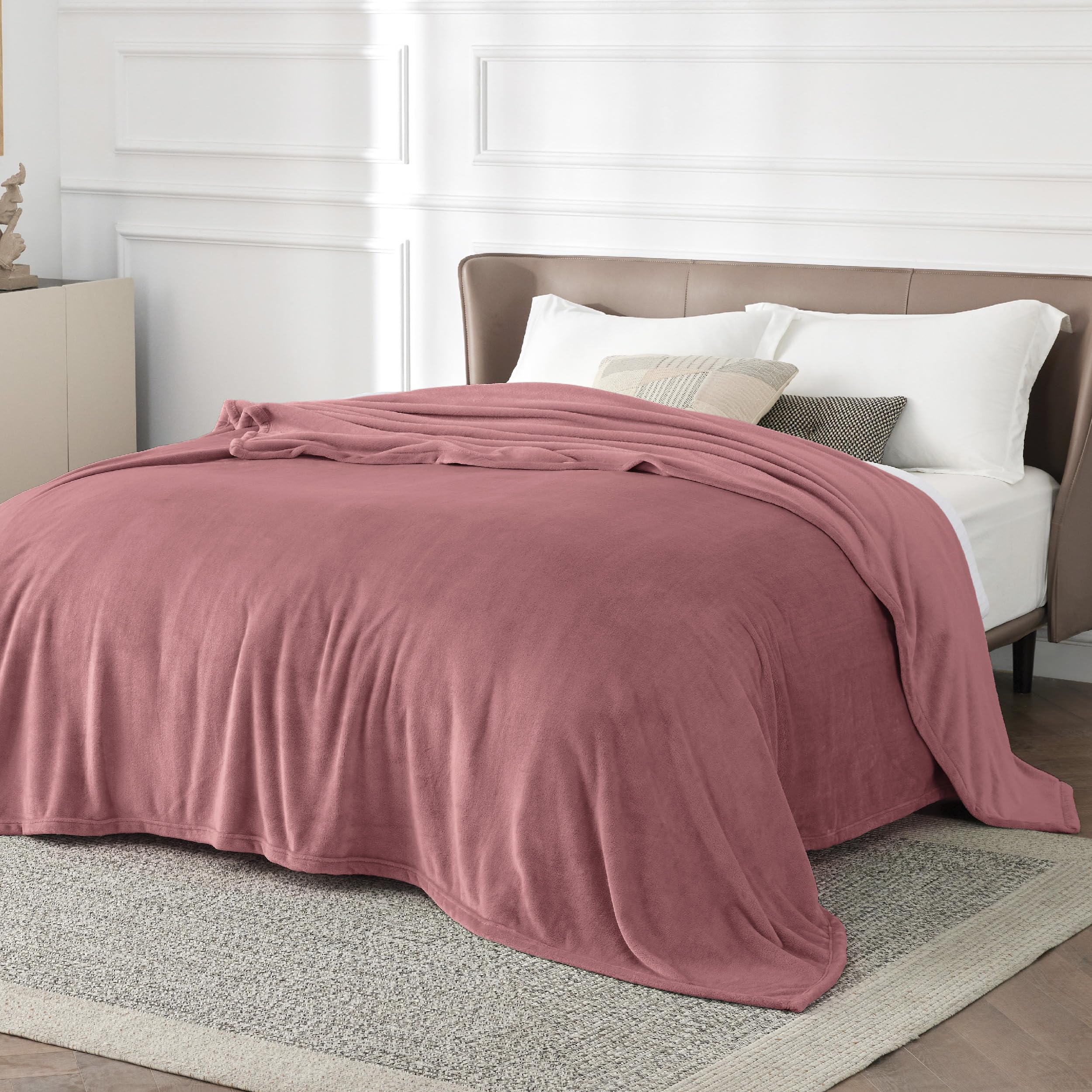 Bedsure GentleSoft fleece blanket folded on bed shows plush, inviting texture.