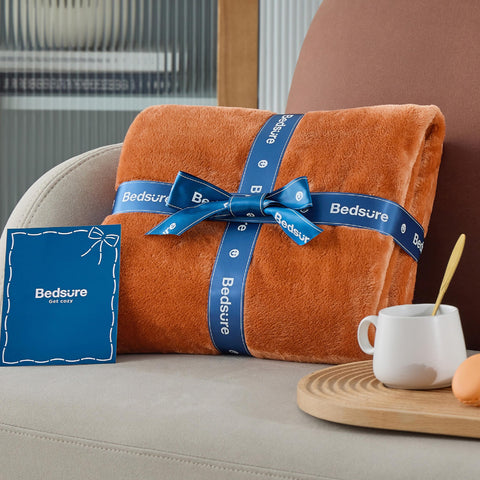 Gift-wrapped Bedsure GentleSoft fleece blanket ideal for cozy occasions