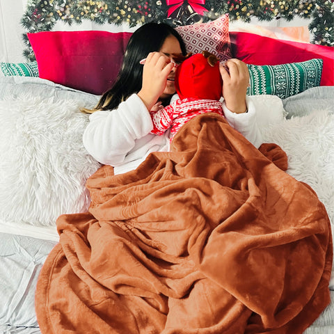 Pet-friendly Bedsure GentleSoft blanket draped for cozy couch moments