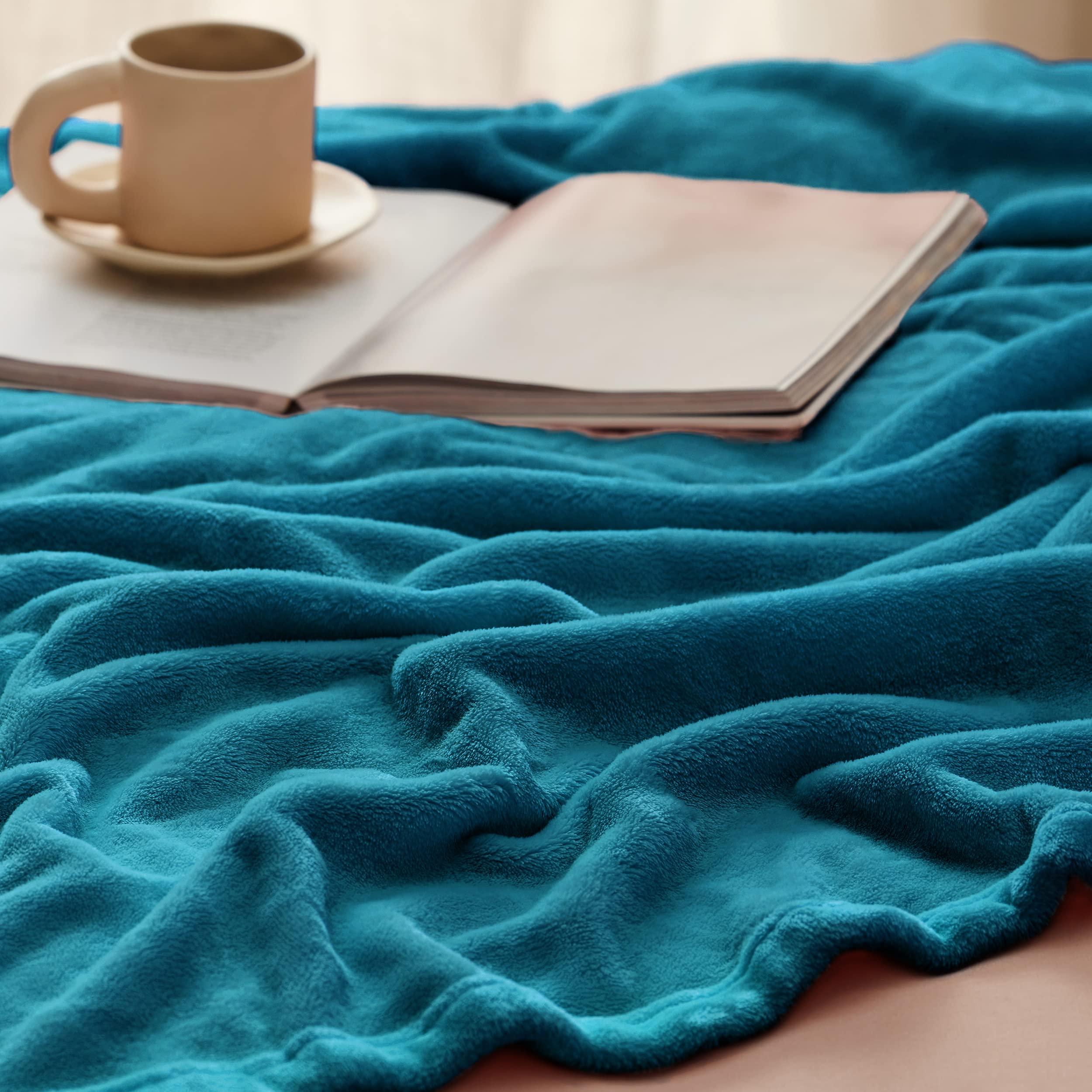 Bedsure GentleSoft fleece blanket teal queen beside pet bed for warmth