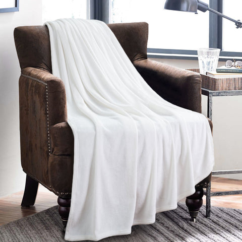 Bedsure GentleSoft fleece blanket twin white folded on bed highlights lightweight warmth.