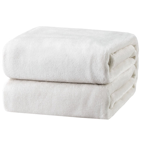 Bedsure GentleSoft fleece blanket white folded, plush texture for year-round coziness.
