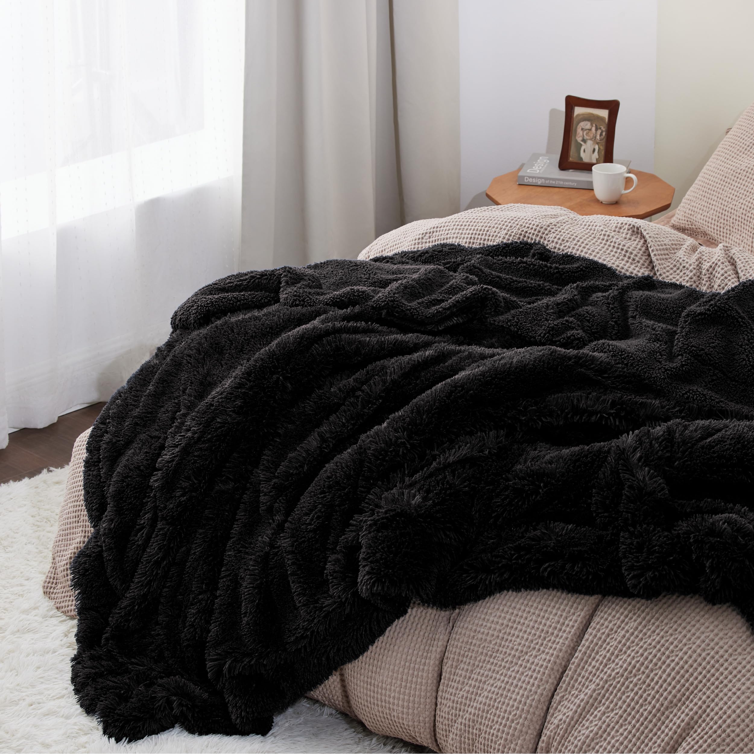 Bedsure GentleSoft throw draped on bed for soft, cozy warmth all night.