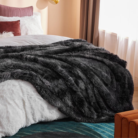Bedsure GentleSoft blanket styled in a living room for cozy decor