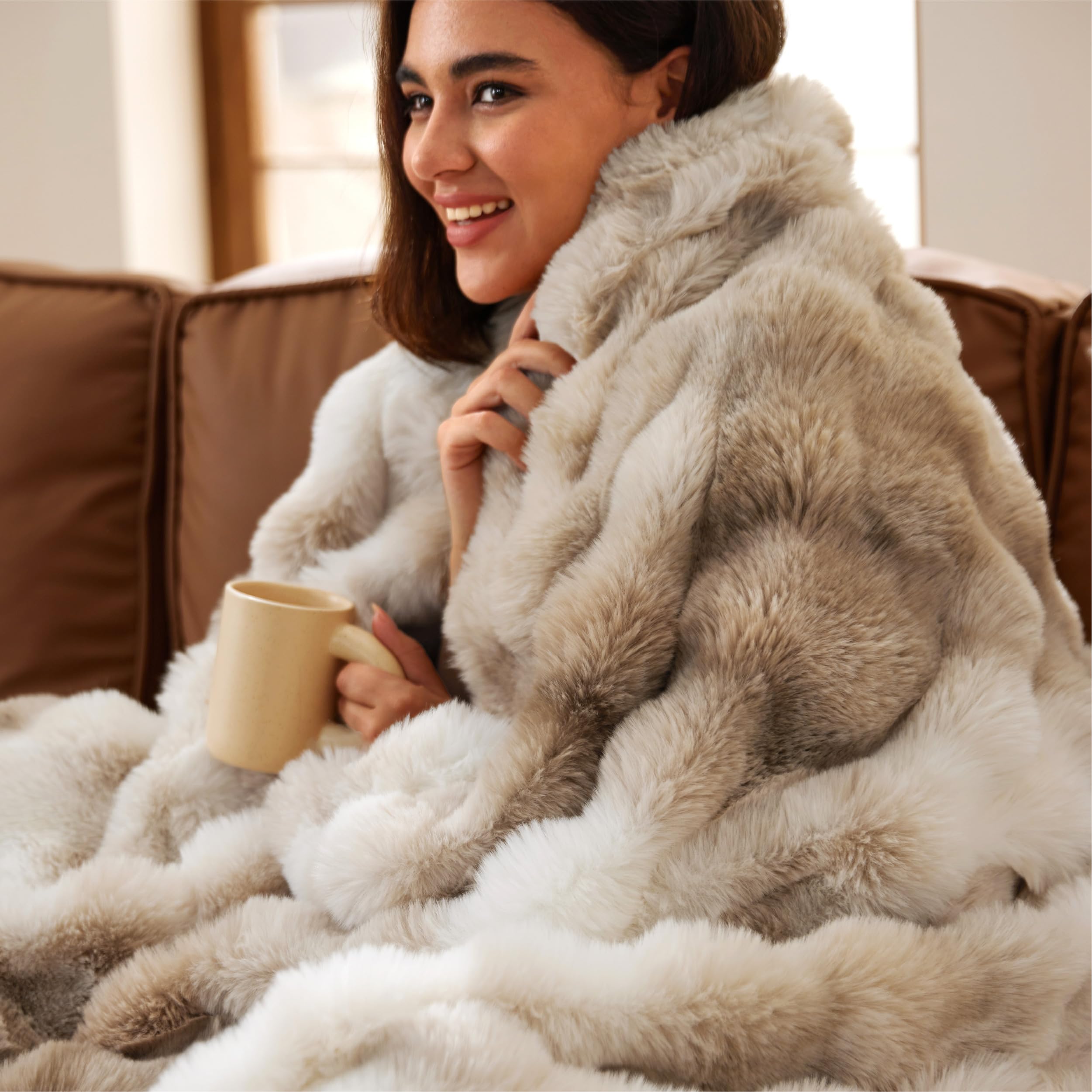 Bedsure GentleSoft fluffy faux fur throw front view shows cloudlike warmth for cozy lounging.