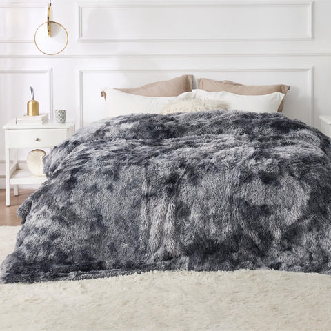 Bedsure GentleSoft fluffy king blanket closeup shows tie-dye grey plush texture for warmth