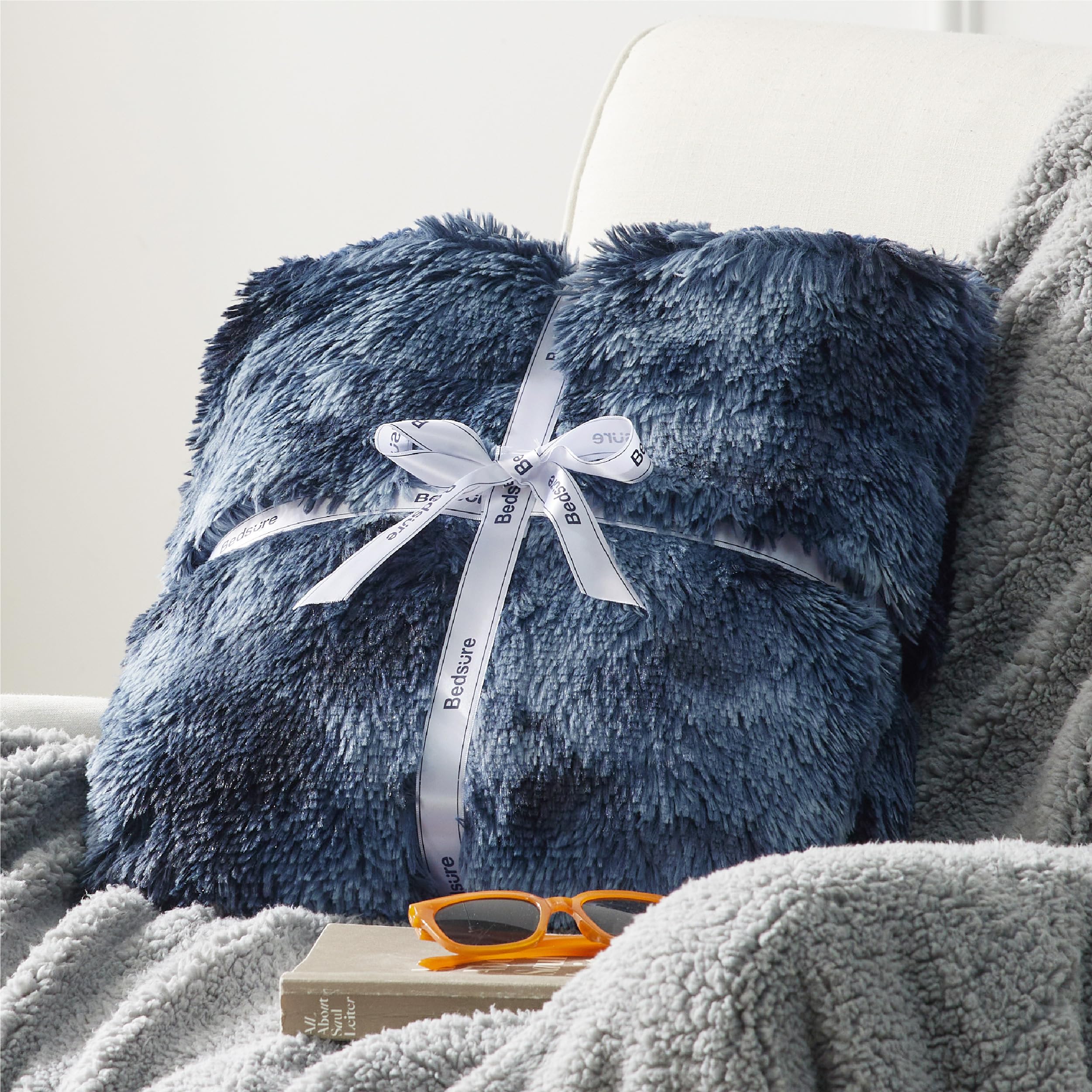 Bedsure GentleSoft Fluffy Navy Throw giftwrap presentation ideal for gifting.
