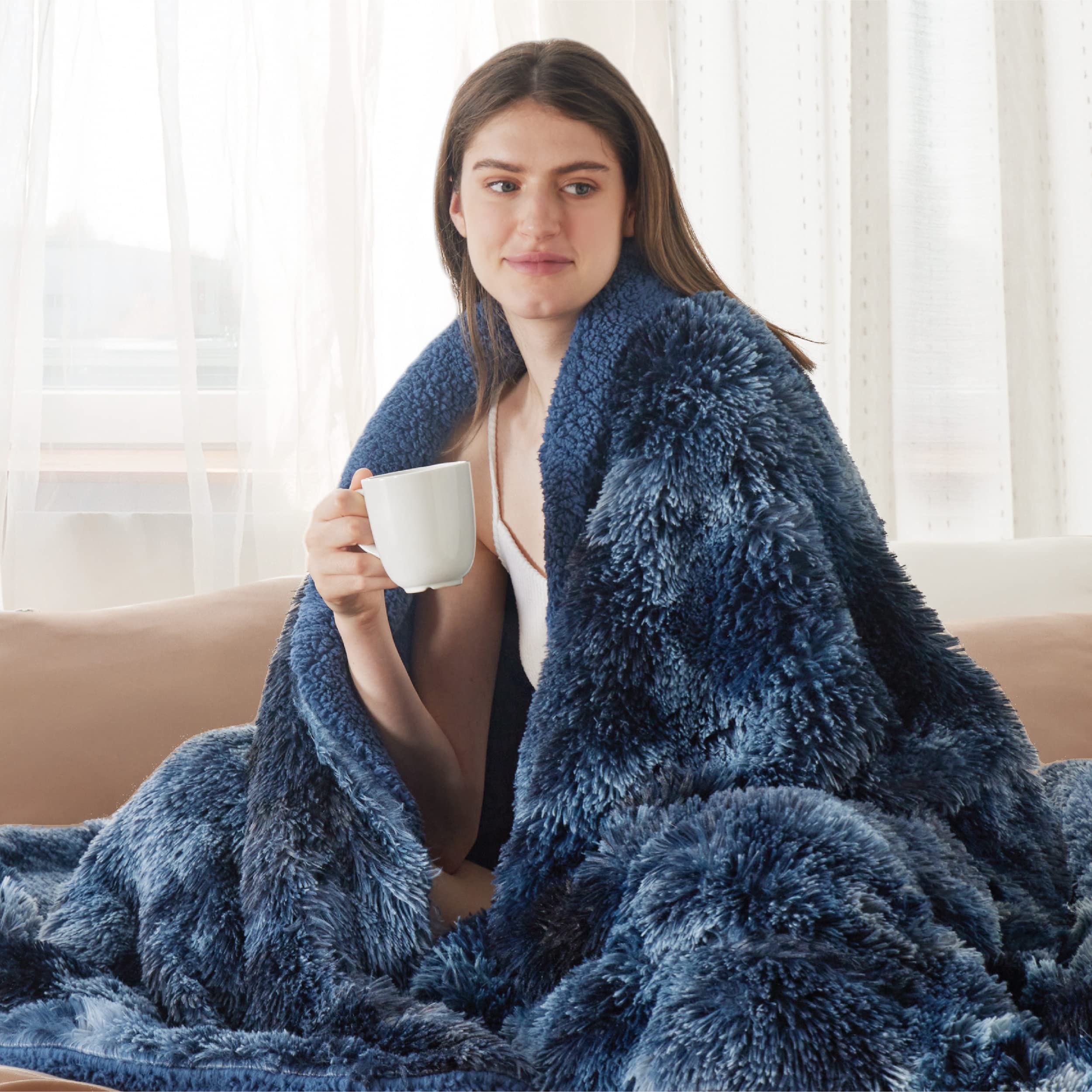Bedsure GentleSoft Fluffy Navy Throw pet cuddle ready blanket.