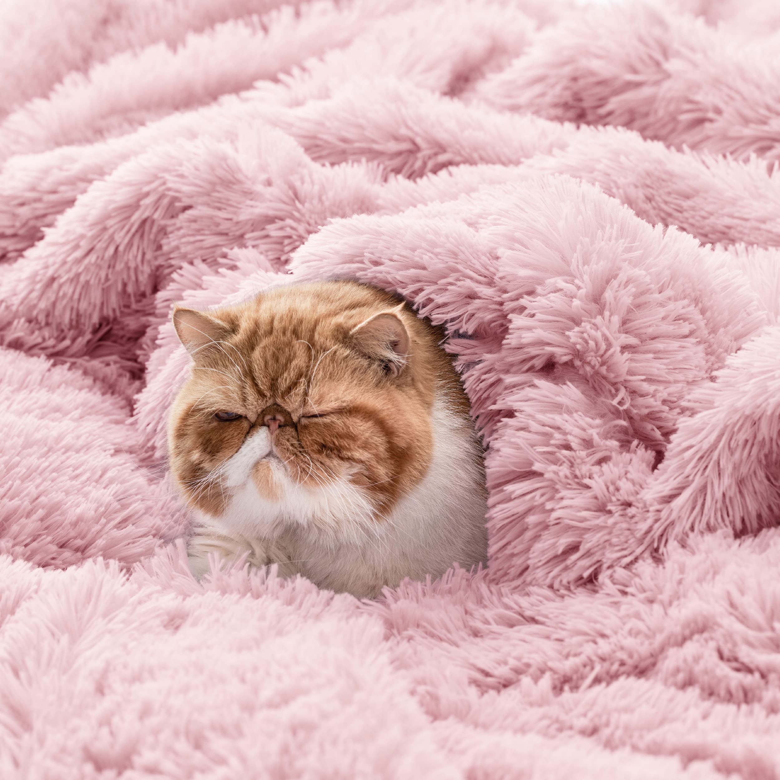Bedsure pink throw as an elegant decor piece to elevate bed or sofa styling