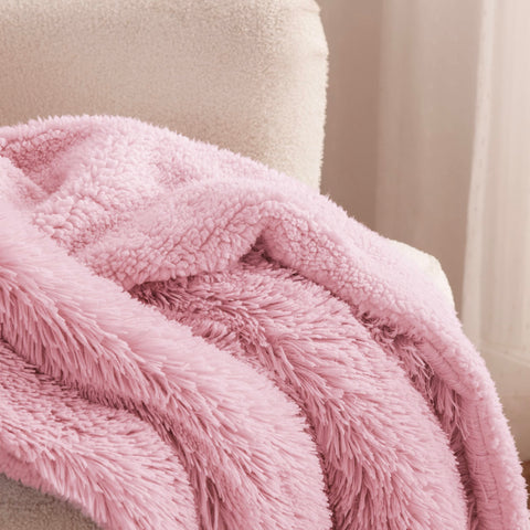 Bedsure GentleSoft pink throw offering thick warmth for couch snuggling