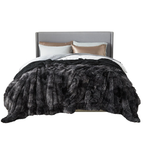 Bedsure GentleSoft fluffy tie-dye blanket folded, cozy warmth and plush texture.