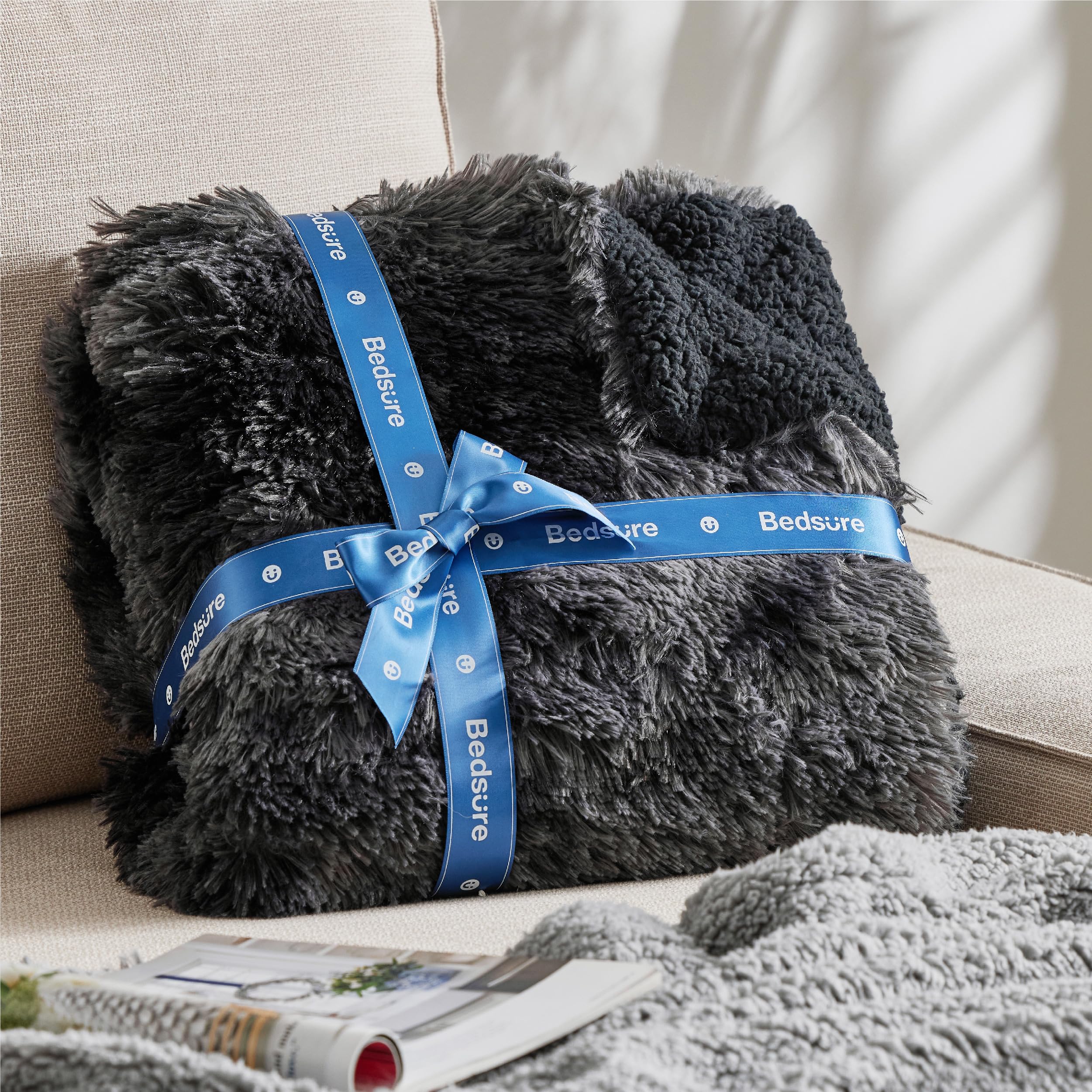 Bedsure GentleSoft tie-dye blanket with festive gift wrap ready for gifting.