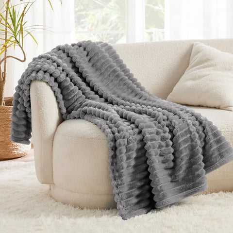Bedsure GentleSoft Frost Gray blanket ultra-soft fabric for cozy relaxation.
