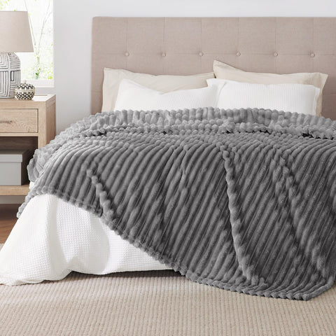 Bedsure blanket complements bedroom and living room decor.