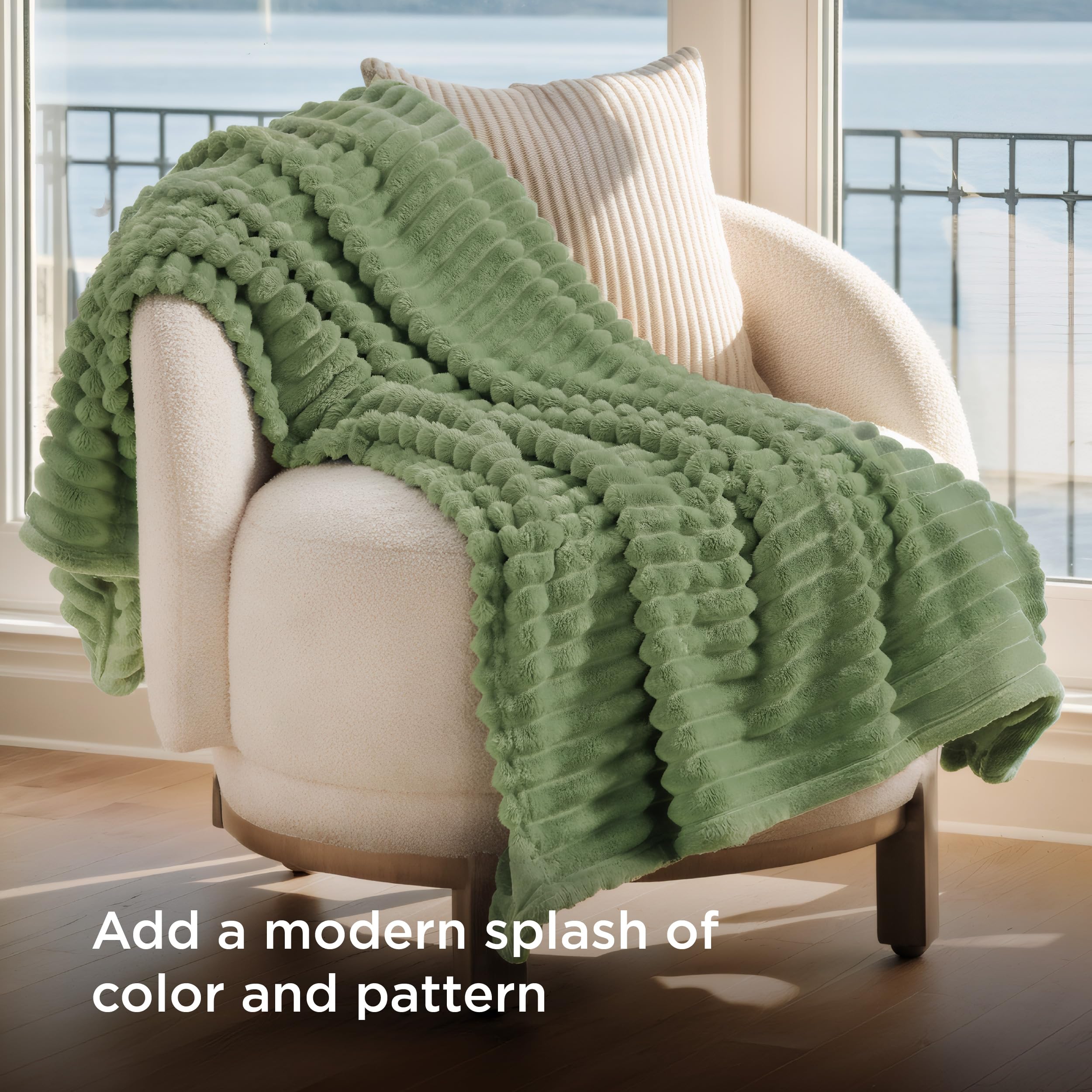 Bedsure GentleSoft Green Throw on bed, ideal for evening snuggling.
