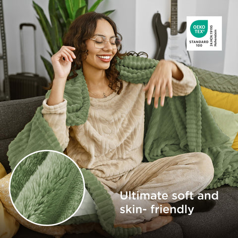 Bedsure GentleSoft Green Throw neatly rolled for compact storage and quick access.