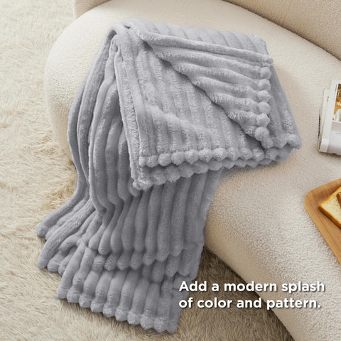 Bedsure GentleSoft Grey Throw in bedroom decor provides cozy vibes and soft contrast.