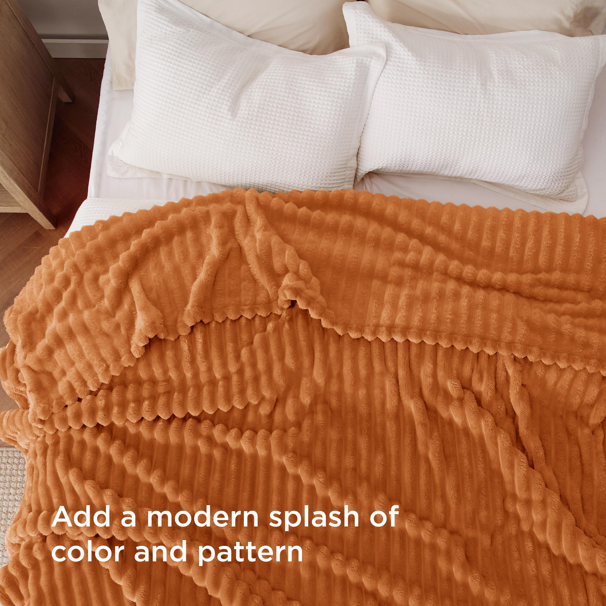 Bedsure GentleSoft blanket on couch ready for a cozy movie night.