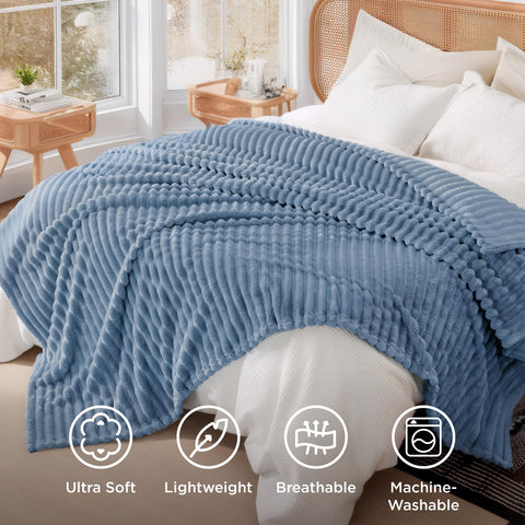 Bedsure GentleSoft blanket draped over chair for lounging.