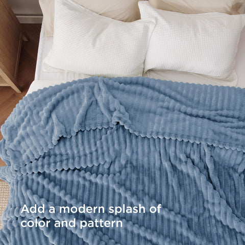 Bedsure GentleSoft King Blanket folded on bed, warm yet lightweight.