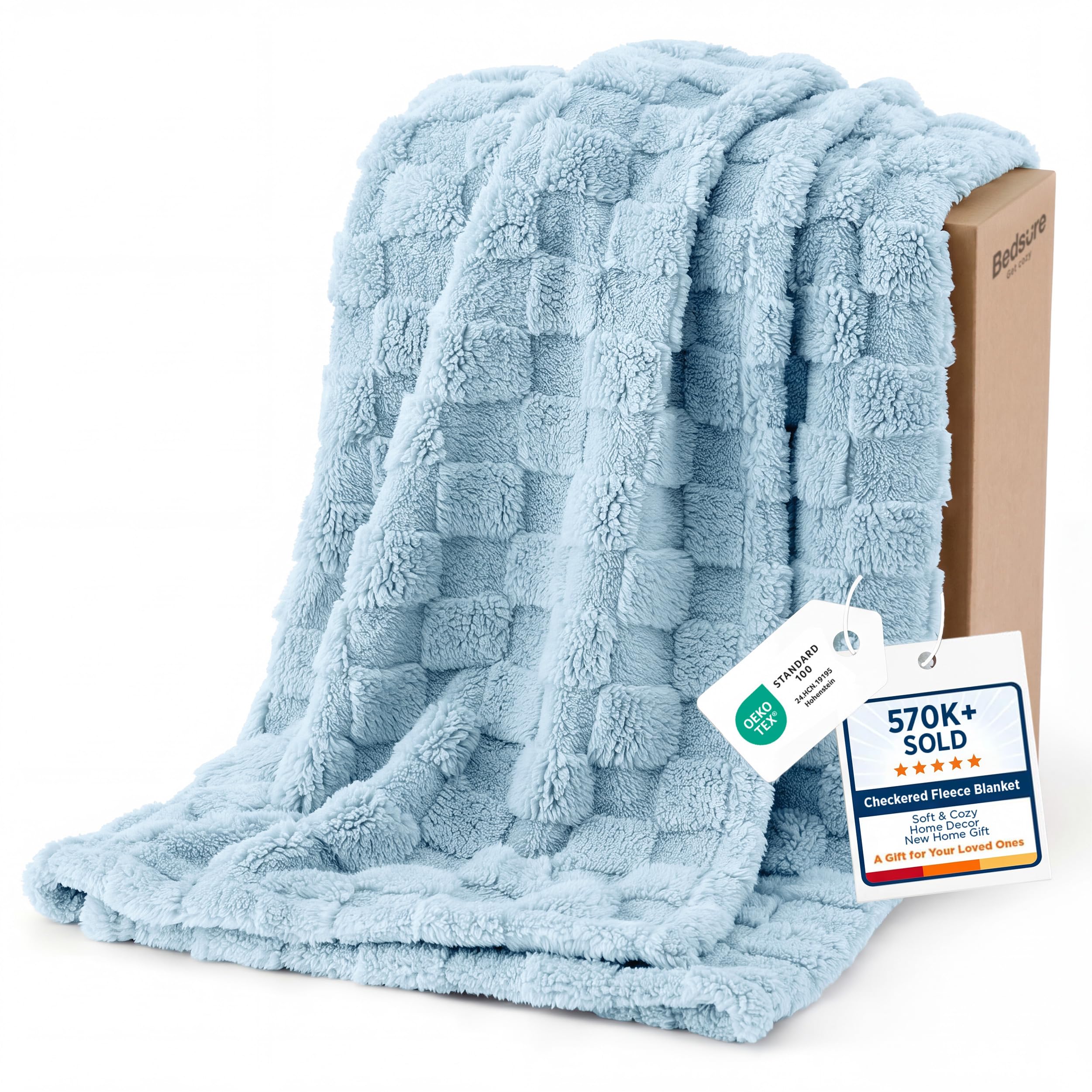 Bedsure GentleSoft light blue throw on sofa provides cozy warmth for evenings.