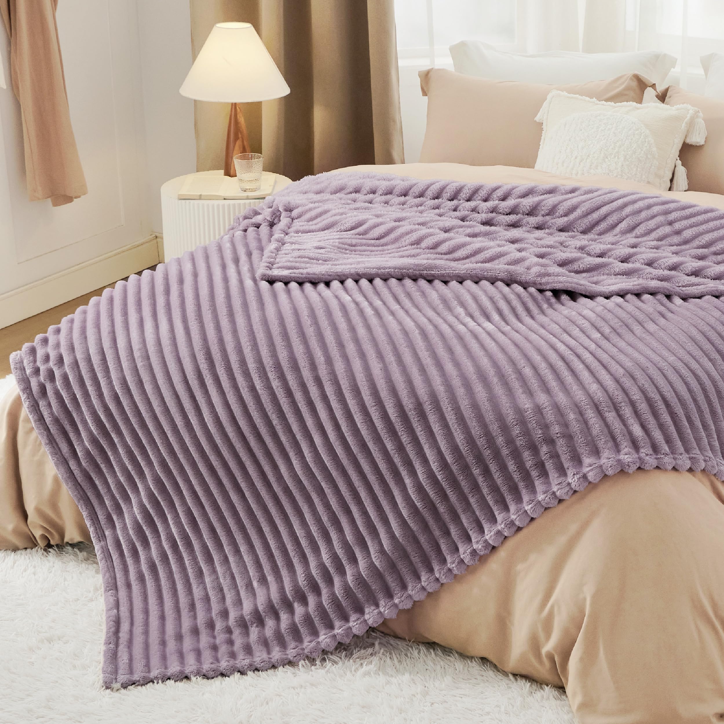 Bedsure GentleSoft draped over a chair shows versatile lounging options.